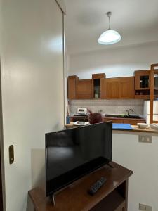 Η κουζίνα ή μικρή κουζίνα στο Monte Tauro Apartment +6 φωτογραφίες