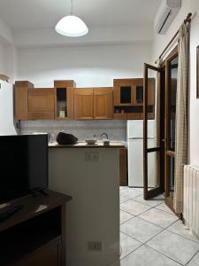 Η κουζίνα ή μικρή κουζίνα στο Monte Tauro Apartment