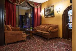 Posezení v ubytování Ecoland Hotel