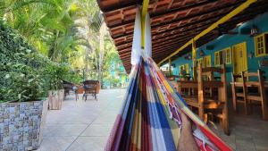 Um jardim em Pousada Tropical Araçatiba
