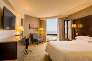 Postel nebo postele na pokoji v ubytování Sheraton Grand Panama