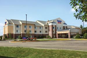 a hotel building with a parking lot in front of it at Fairfield Inn & Suites by Marriott Weirton in Weirton