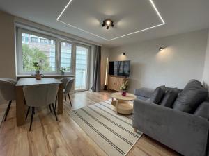 Prostor za sedenje u objektu Emilii Plater 55 - Modern Full Apartment