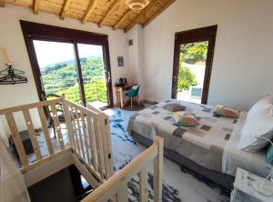 Postel nebo postele na pokoji v ubytování Villa Pounta Family