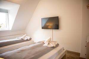Tempat tidur dalam kamar di Wohnung für 4 Gäste in Laatzen Messe- und Citynah