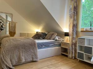 Posteľ alebo postele v izbe v ubytovaní Comfort Zone Ostroda BOHO SCANDI