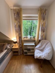 Posteľ alebo postele v izbe v ubytovaní Comfort Zone Ostroda BOHO SCANDI
