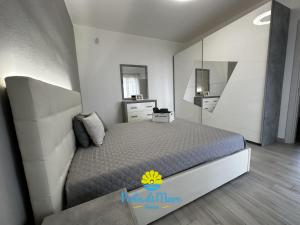 Postel nebo postele na pokoji v ubytování Perla di Mare