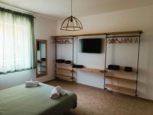 Postel nebo postele na pokoji v ubytování Casa Mimma