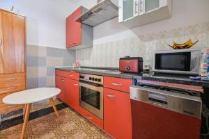 Kuchyň nebo kuchyňský kout v ubytování Apartments Smoky