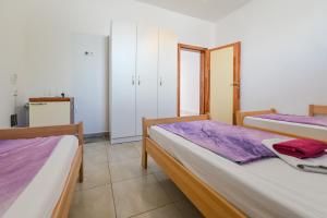 Postel nebo postele na pokoji v ubytování Apartments Smoky