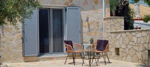 Balkón nebo terasa v ubytování Electra Villa & Pool Studios