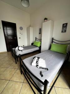 A bed or beds in a room at Porta Garibaldi