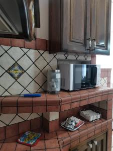A kitchen or kitchenette at Porta Garibaldi