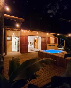 The swimming pool at or close to Vila dos Macacos Trancoso