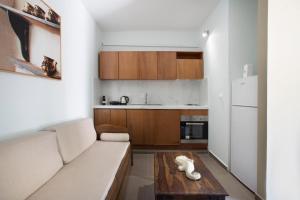 A kitchen or kitchenette at Poseidon Hotel