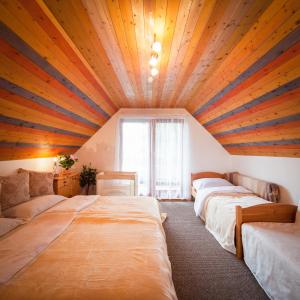 Łóżko lub łóżka w pokoju w obiekcie Apartment House 41