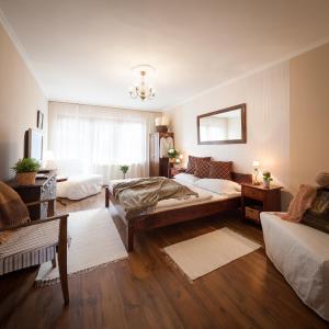 Łóżko lub łóżka w pokoju w obiekcie Apartment House 41