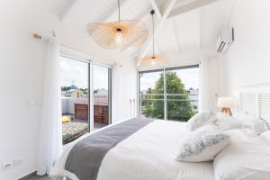 Ένα ή περισσότερα κρεβάτια σε δωμάτιο στο Only4view - Rooftop & spa Sainte-Anne