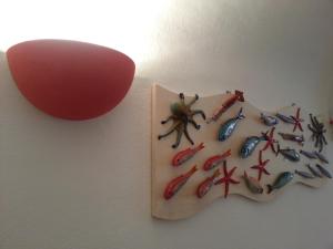 a plate with crabs on it on a wall at Hotel Argentina in Santa Margherita Ligure