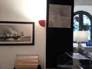 a room with a picture of a boat on the wall at Hotel Argentina in Santa Margherita Ligure