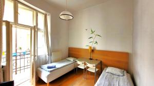 Posteľ alebo postele v izbe v ubytovaní Central Station Hostel