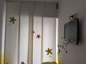 TV a/nebo společenská místnost v ubytování Casita playa