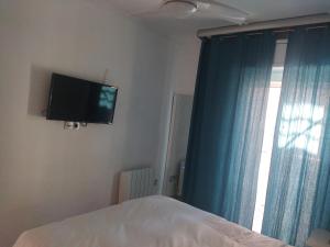 TV a/nebo společenská místnost v ubytování Casita playa