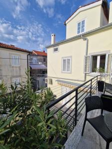 a view from the balcony of the apartment at Apartment and Room Marija in Krk