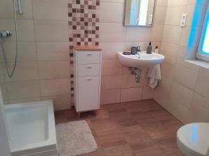 Kúpeľňa v ubytovaní Vörösmarty Apartman