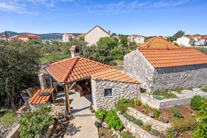 an overhead view of a house with an orange roof at Apartment Anchor in Šibenik
