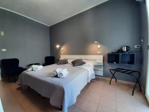 Ένα ή περισσότερα κρεβάτια σε δωμάτιο στο Hotel Originale by ALEhotels