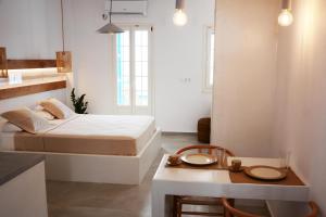 A bed or beds in a room at Akrotiri