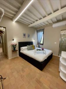 Postel nebo postele na pokoji v ubytování B&B La Fenice