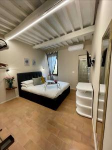 Postel nebo postele na pokoji v ubytování B&B La Fenice