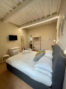 Postel nebo postele na pokoji v ubytování B&B La Fenice