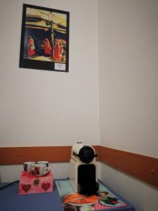 a table with a coffee maker and two cups on it at Dimora alla Villa in Ostuni +43 photos