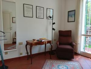 Posezení v ubytování Villetta con giardino a due passi dal mare