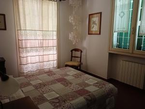 Postel nebo postele na pokoji v ubytování Villetta con giardino a due passi dal mare