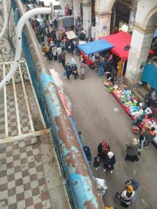 an overhead view of a market with a crowd of people at STUDIO BASSE CASBAH in Kasbah