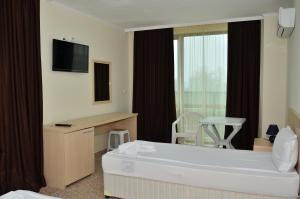 Krevet ili kreveti u jedinici u objektu La Piazza Primorsko Rooms & Apartments