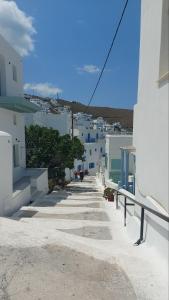 a view of a street with white buildings at Angel Maisonette and Studio in Astypalaia Town +30 photos