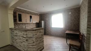 Kuchyň nebo kuchyňský kout v ubytování Lexo Guest house + 25 fotografií