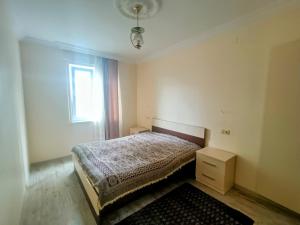 Postel nebo postele na pokoji v ubytování Lexo Guest house