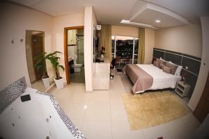 Postel nebo postele na pokoji v ubytování Garda Hotel