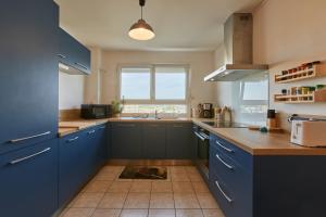Kuchyňa alebo kuchynka v ubytovaní Appartement avec belle vue dégagée du 11e étage