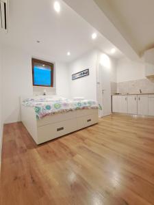 Postel nebo postele na pokoji v ubytování Meressa Nina&Leo Studio Apartments