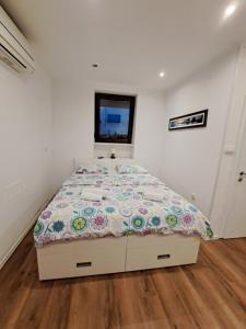 Postel nebo postele na pokoji v ubytování Meressa Nina&Leo Studio Apartments