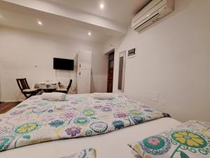 Postel nebo postele na pokoji v ubytování Meressa Nina&Leo Studio Apartments