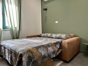 Tempat tidur dalam kamar di La Corte 25